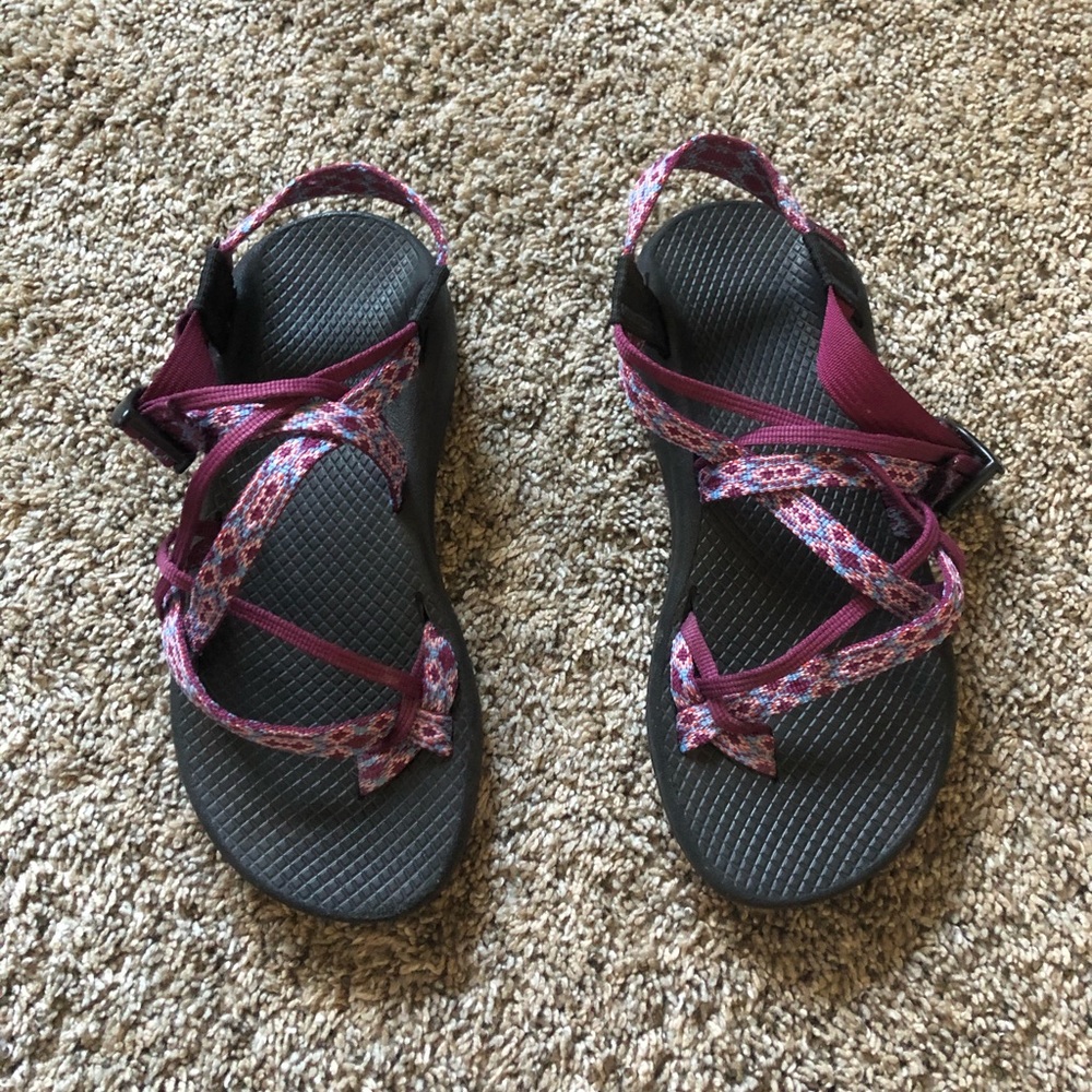 Purple toe strap Chacos.